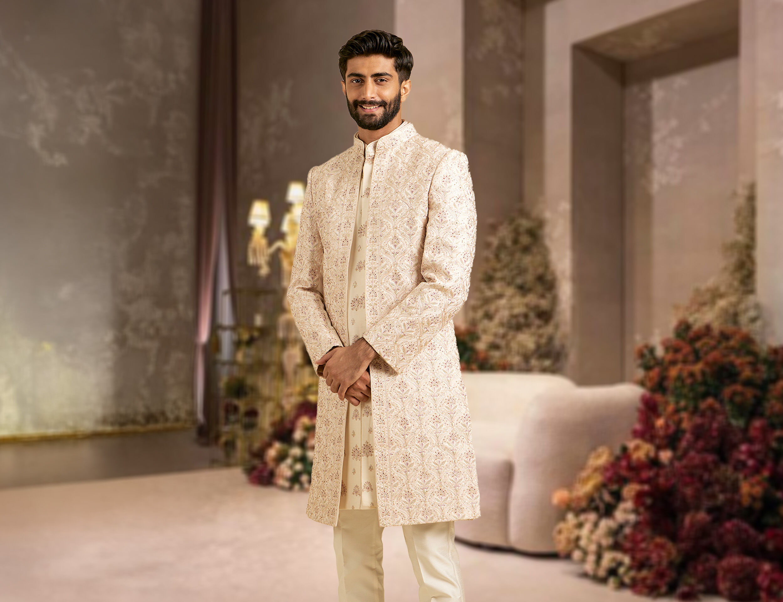 A groom wearing white sherwani for enagement sherwani